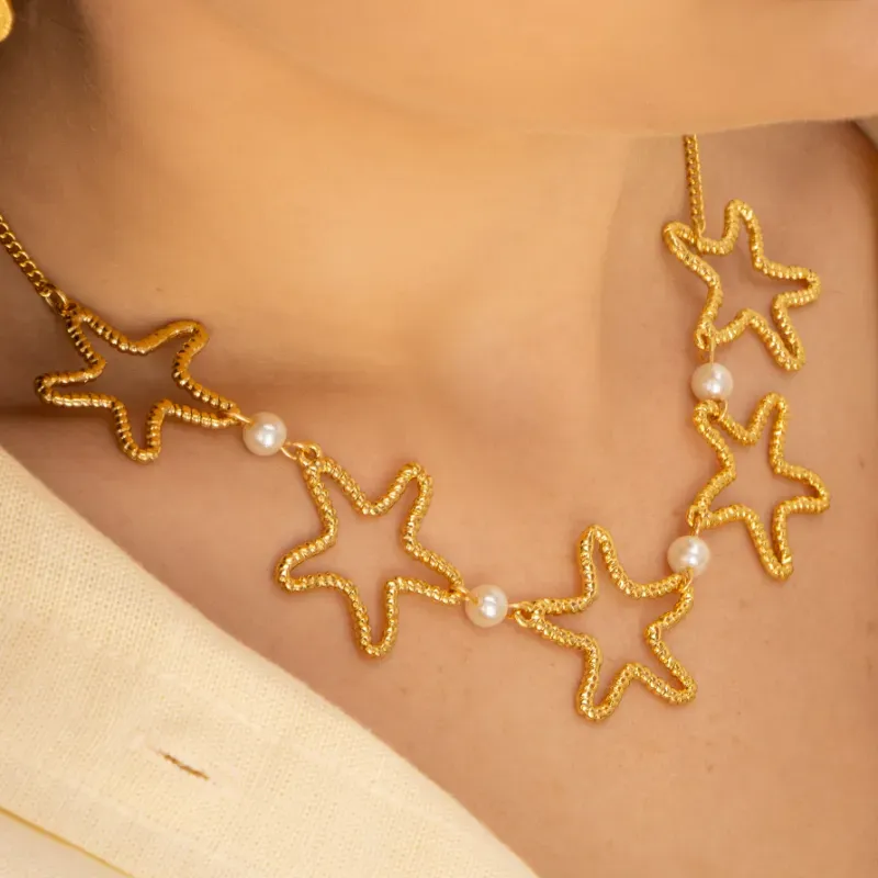 Set collar estrella de mar y perlas+aretes