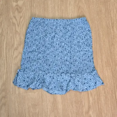 Saya Azul Marino con diseños de flores