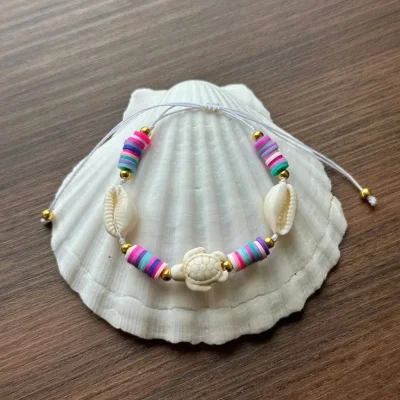 Pulsera de fimos , caracoles y accesorios veraniegos