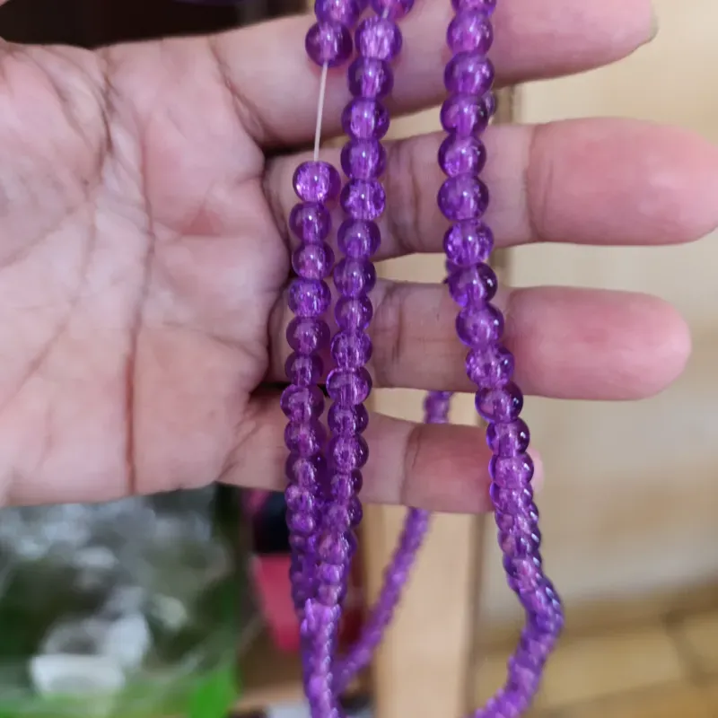 Collares de perlas craqueladas, de vidrio.