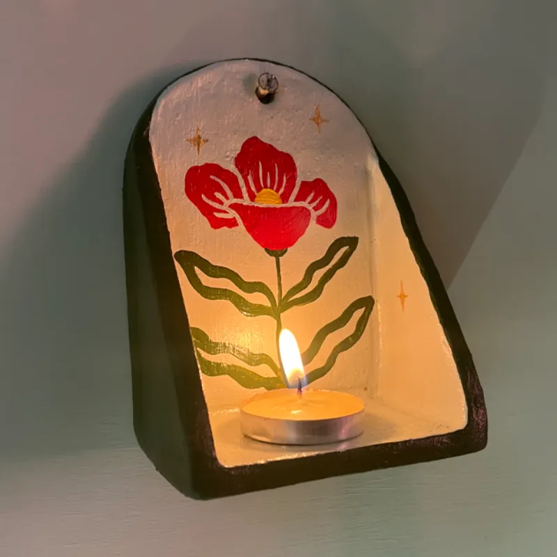 porta vela para pared