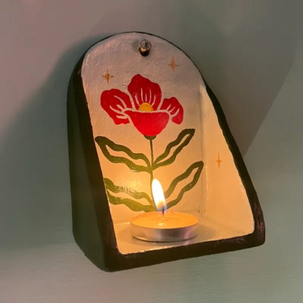 porta vela para pared