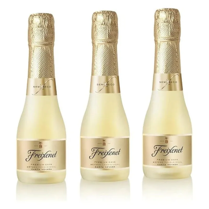 Freixenet (premium cava )mini botella( carta nevada 