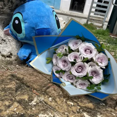 Ramo de flores con peluche