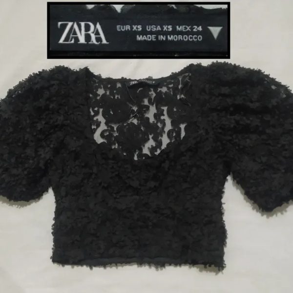 Blusa negra corta, manga globo