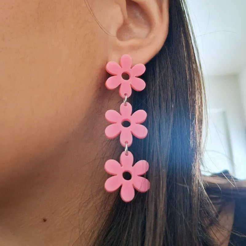 Pendientes largos de flores rosa claro