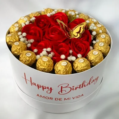 Caja circular con bombones por los bordes