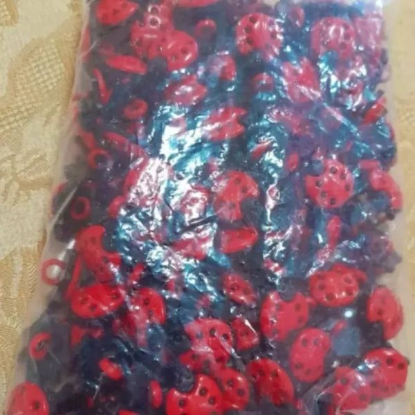 Botón forma de mariquita