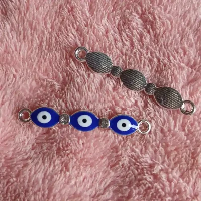 Dije Conector ojo turco triple azul con detalle de piedra