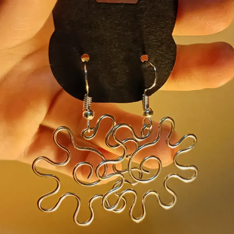 Aretes de sol (ver. 10 mil ya no sé)