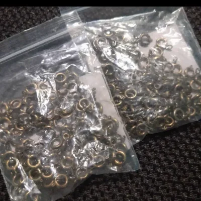 Cierre circular bronceado