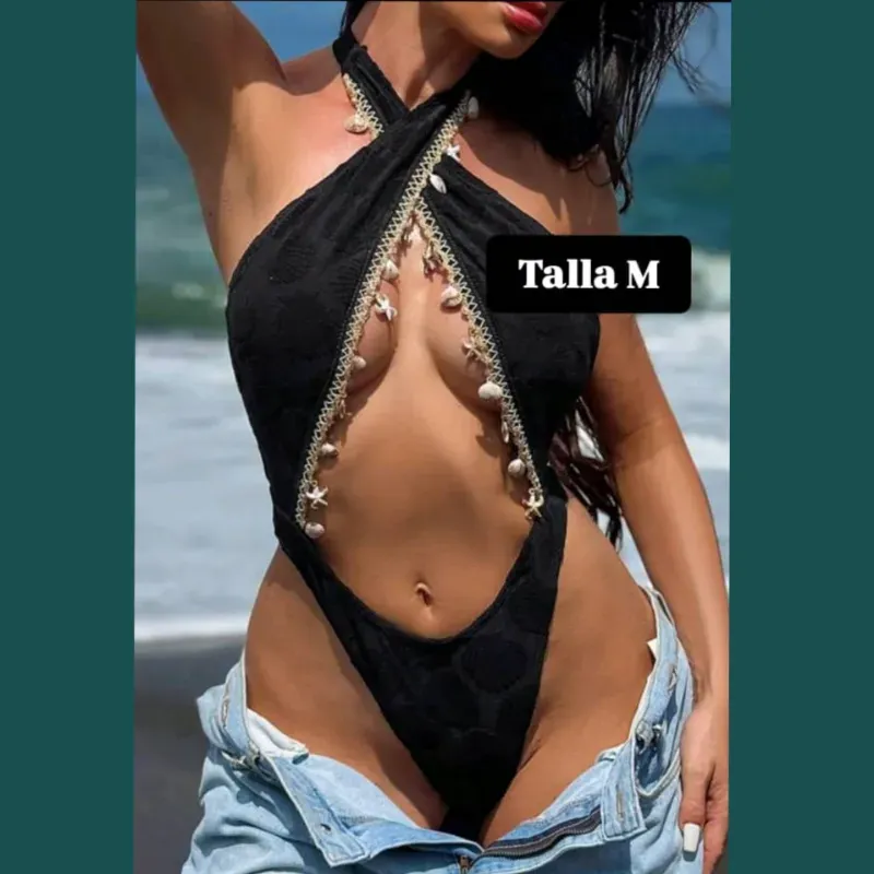 Trusa cruzada con conchas y estrellas marinas