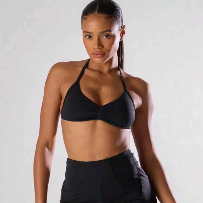 Top negro de tirita en la espalda