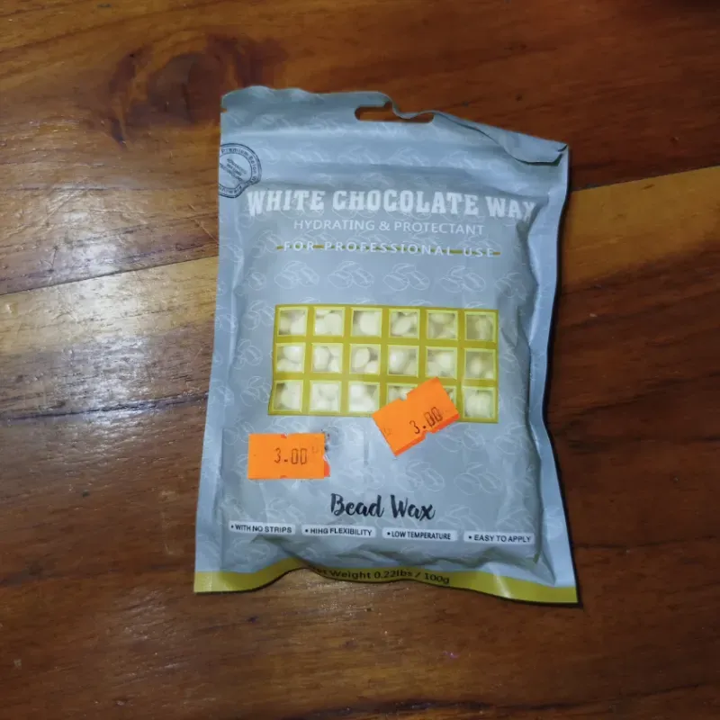 Cera depiladora. Perlas de chocolate