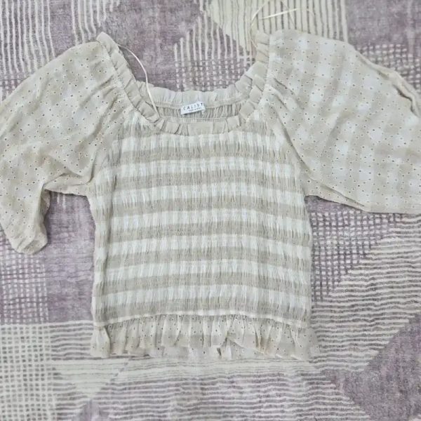 Top beige de mangas