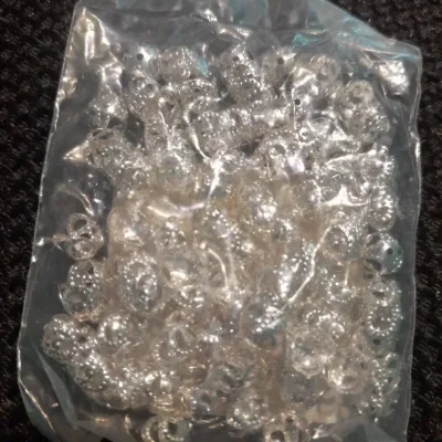 Capuchón chico calado plateado