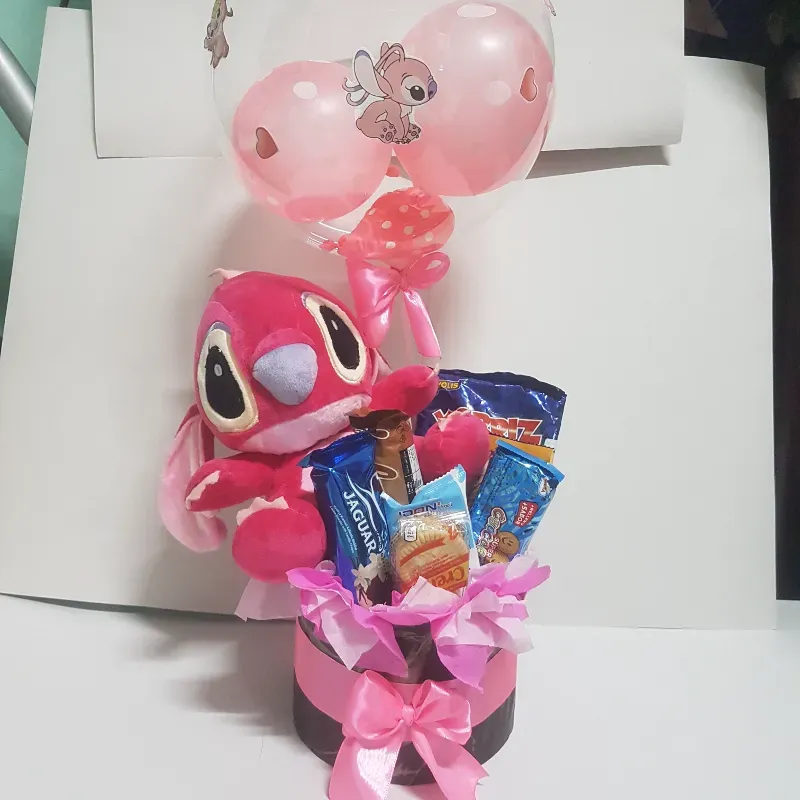 Caja redonda con peluche