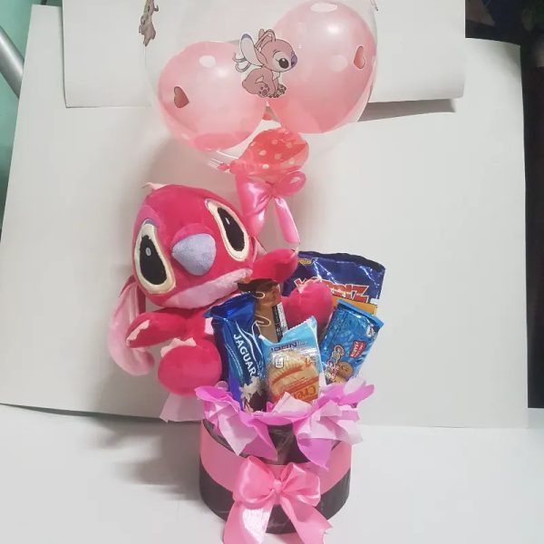 Caja redonda con peluche