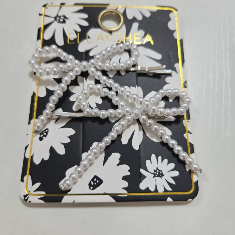 Clip para el pelo de lazos con perlas