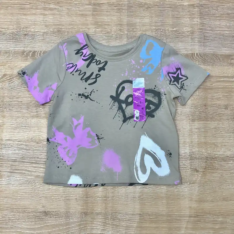 Pulóver con graffiti color marrón