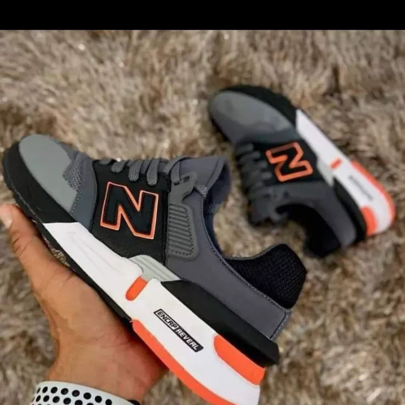 New balance clasica negra y naranja
