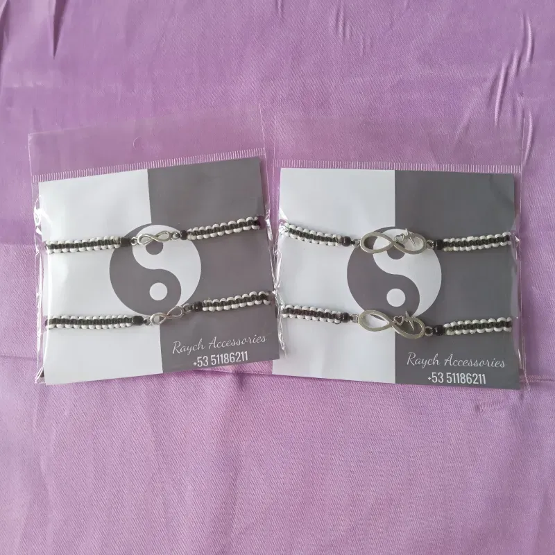 Pulseras tejidas infinito blanco y negro