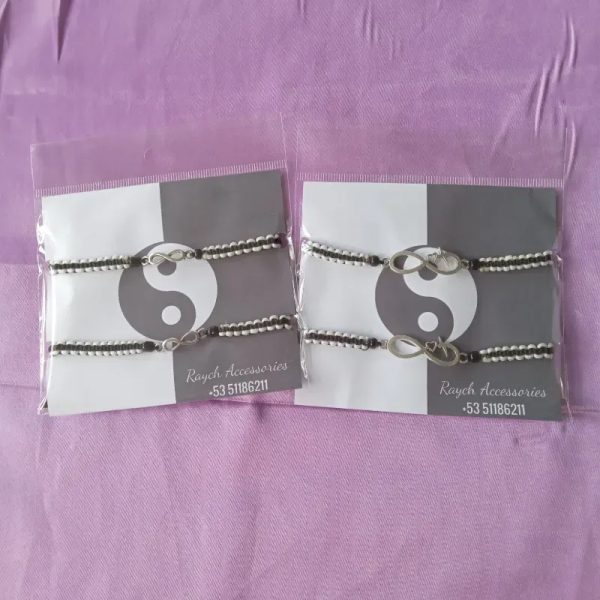Pulseras tejidas infinito blanco y negro