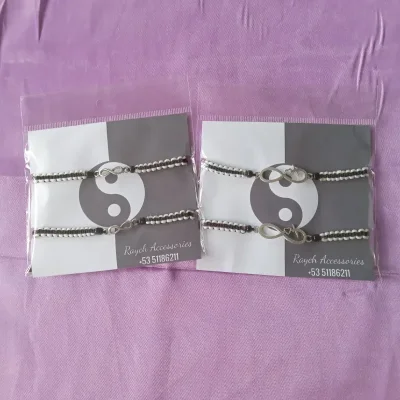 Pulseras tejidas infinito blanco y negro