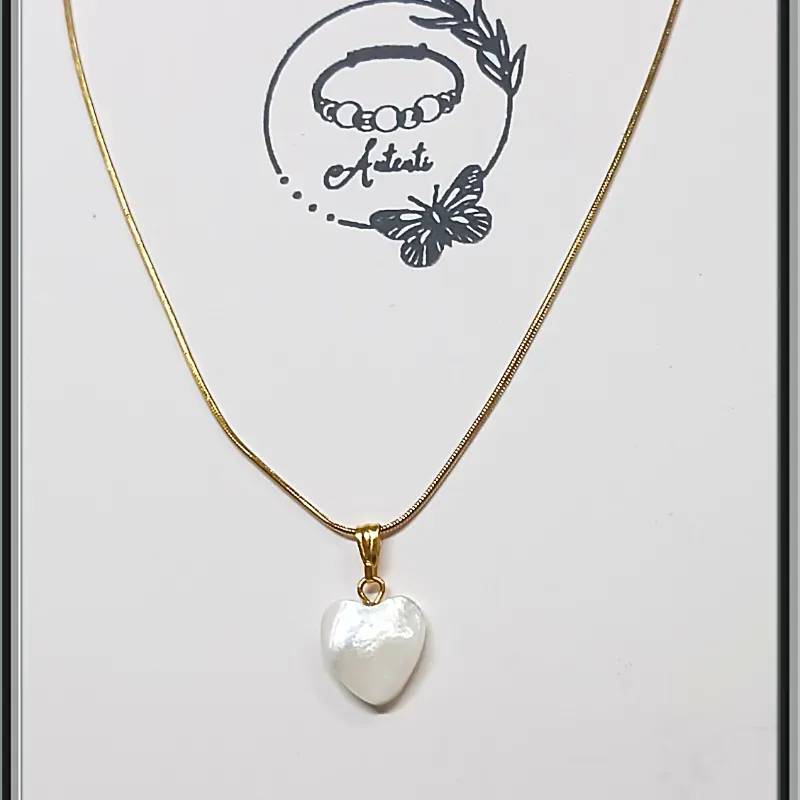 Cadena de acero con corazon nacarado