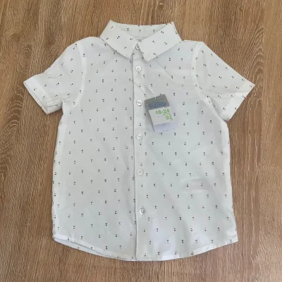 Camisa blanca con detalles en marrón