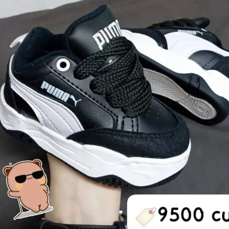 PUMA NEGRO DETALLES BLANCOS