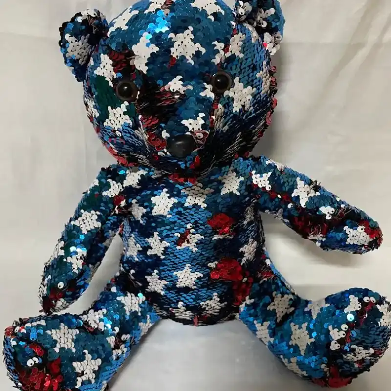 Osito con lentejuelas de colores