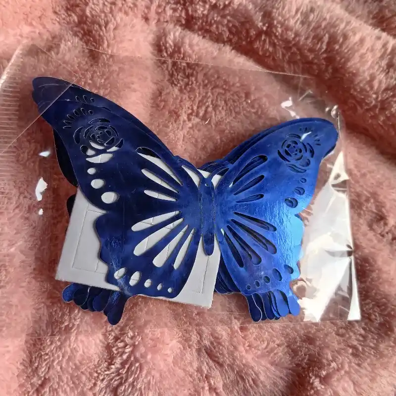 Mariposa decorativa suelta azul rey