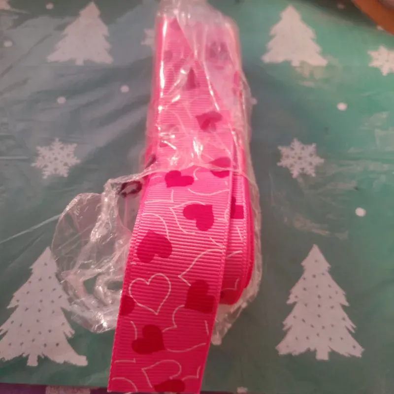 Cinta falla rosada corazones