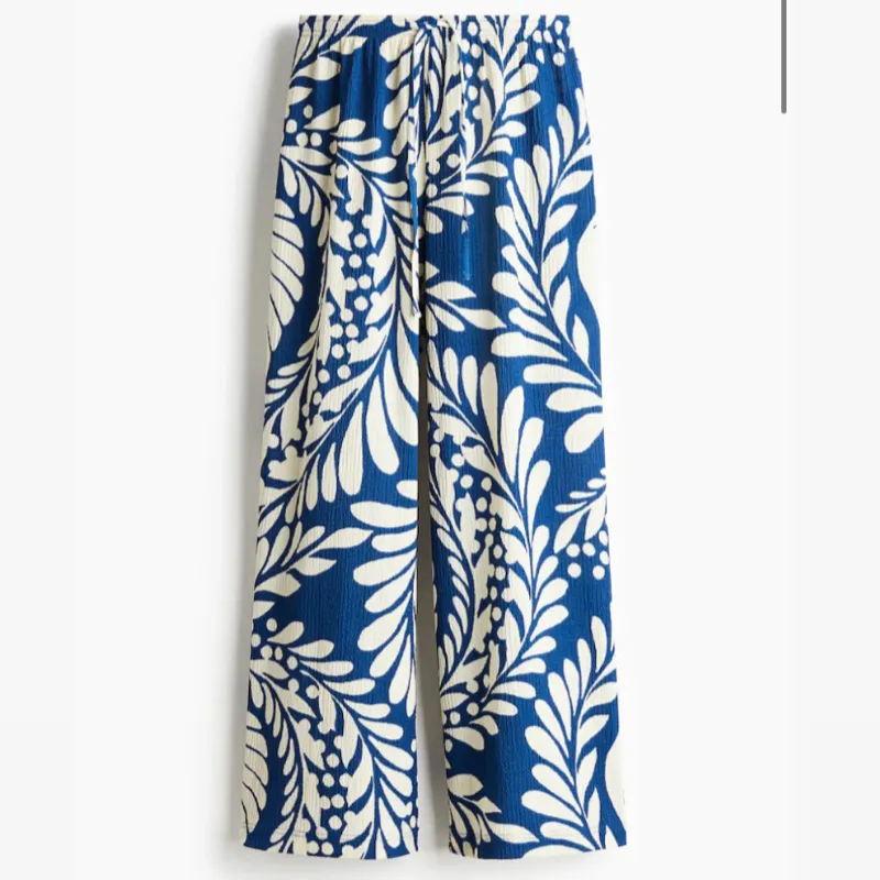 Pantaloneta Azul y Blanca