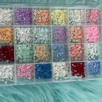 Cajas de lazos y flores de resina