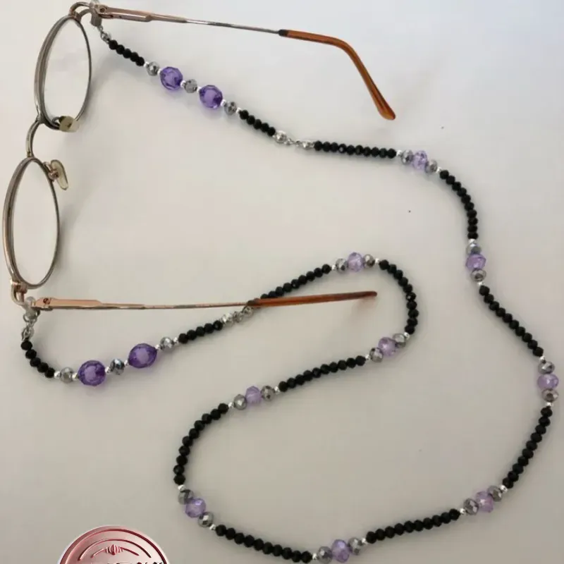 Sujetador de lentes o espejuelos