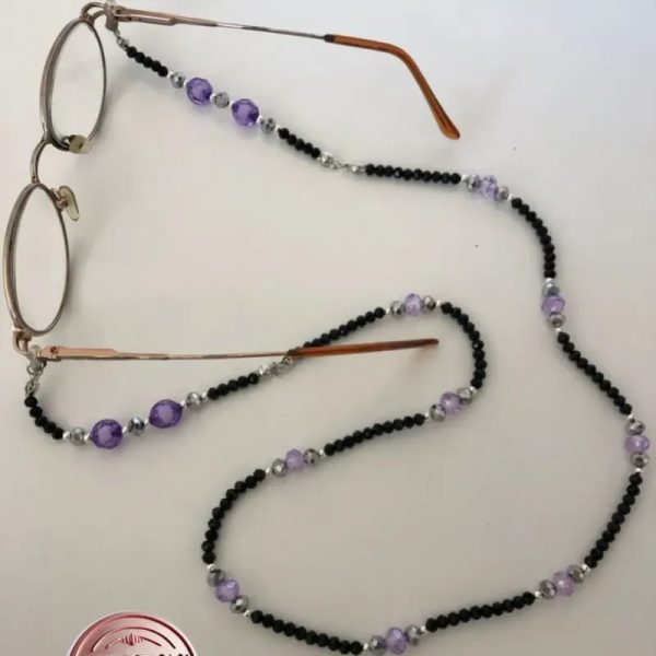 Sujetador de lentes o espejuelos