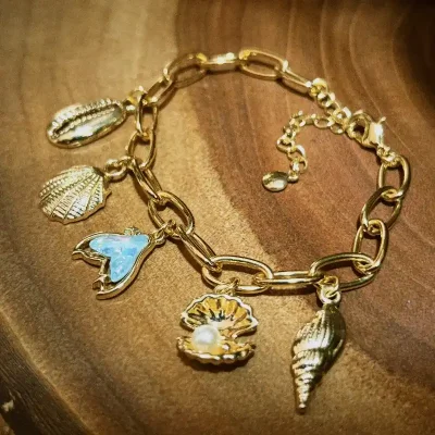 Pulsera dorada de playa