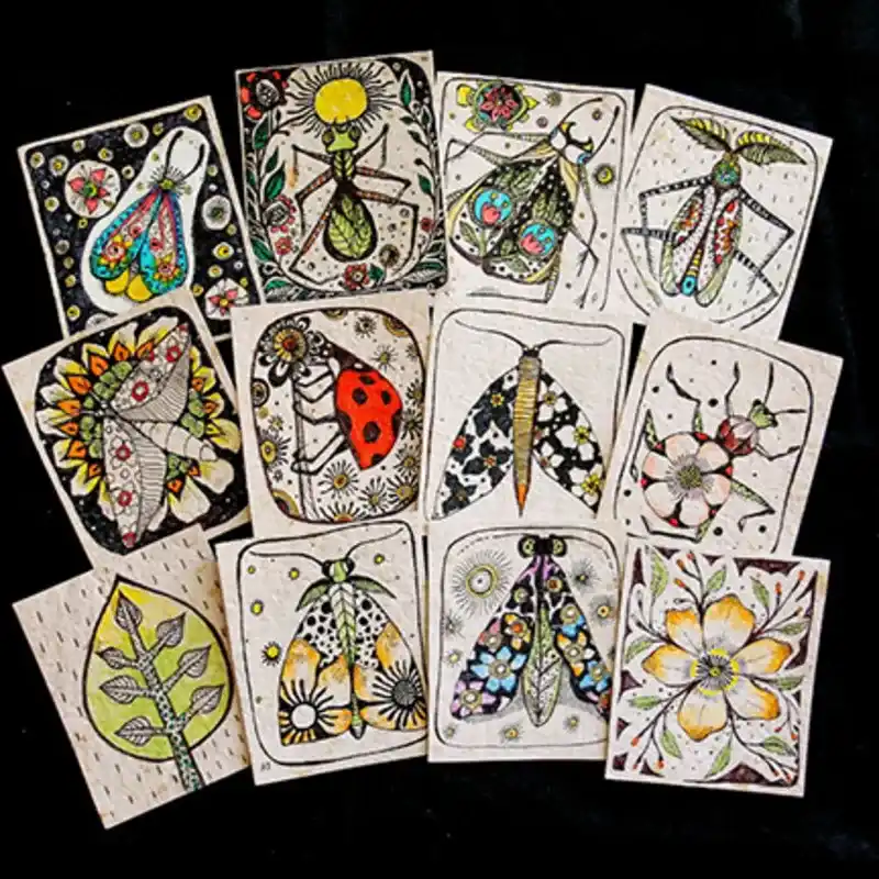 Tarjetas pintadas en papel manufacturado