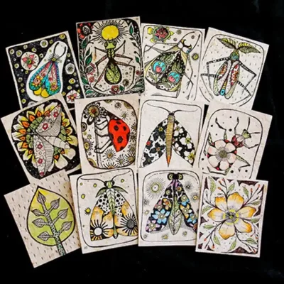 Tarjetas pintadas en papel manufacturado