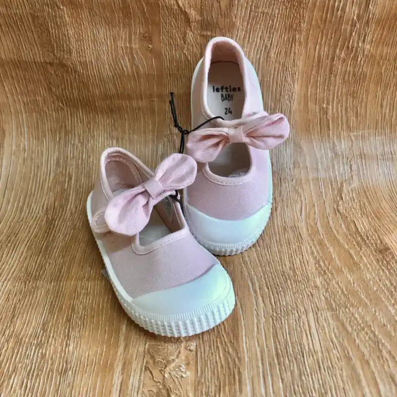 Zapatos con lazo color rosado