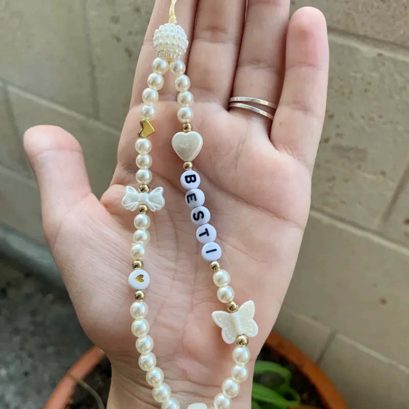 Colgante de celular de perlas