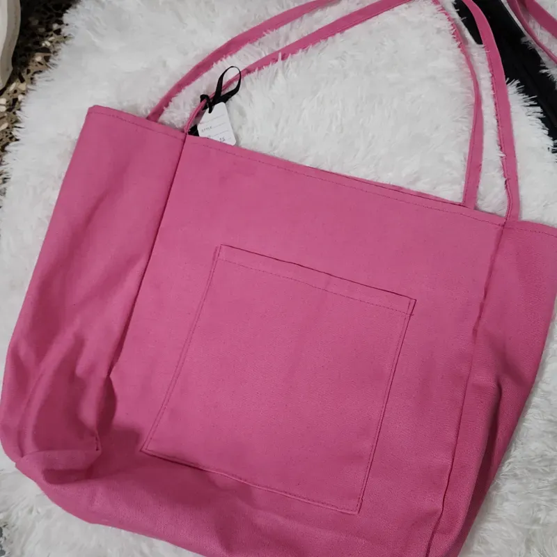 Bolso amplio rosado
