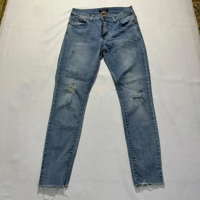 Jean Skinny Mezclilla Oscura con Rotos