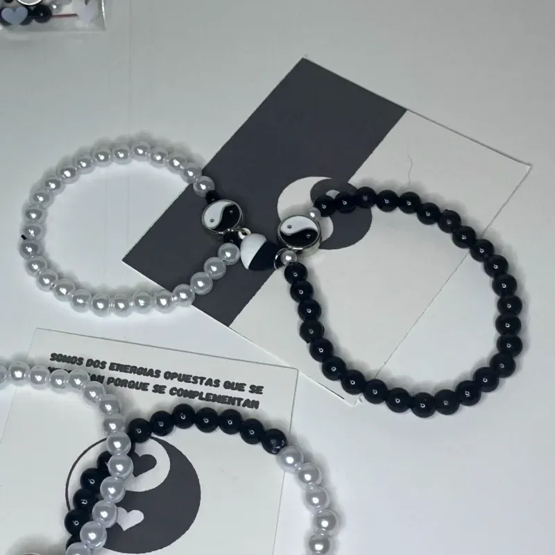 Pareja Pulseras  ying yang perlas con corazón imantado