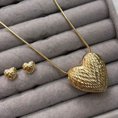 Set de cadena y aretes 