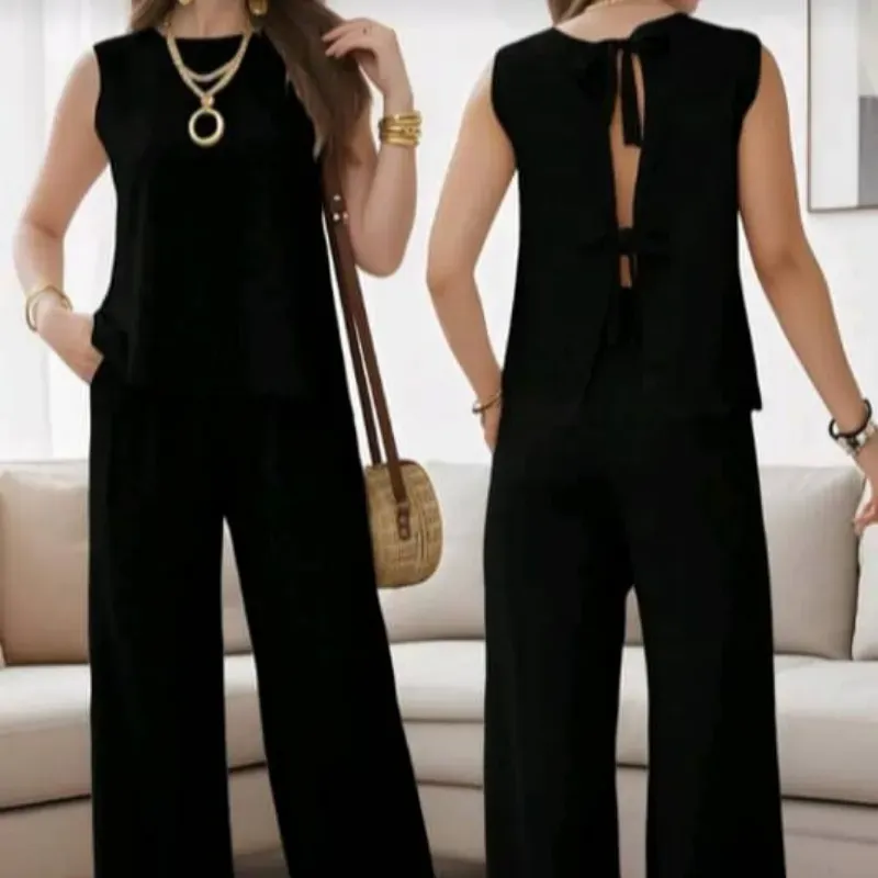 Conjunto negro de pantaloneta y blusas amarradas en la espalda