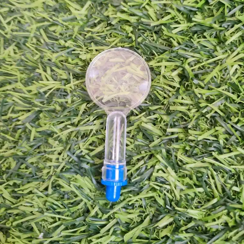 Ensartador de agujas con lupa