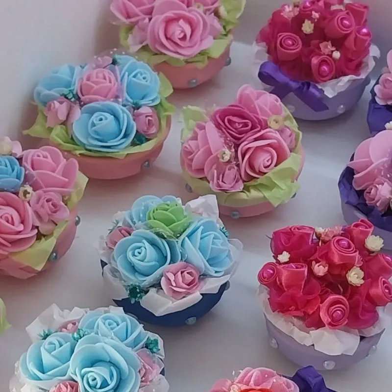 Maceticas de barro con flores